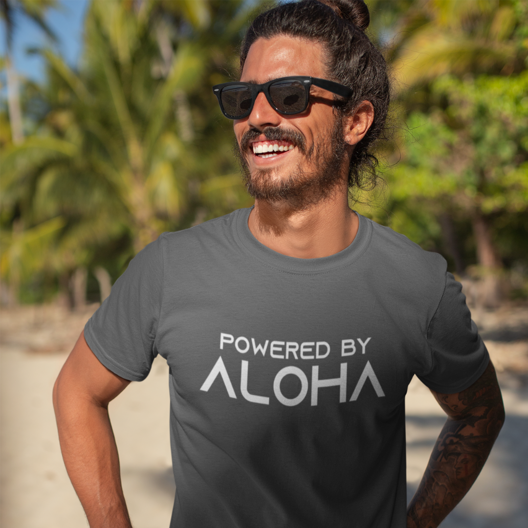 POWERED BY ALOHA Men’s T-Shirt in grey with a vibrant Hawaiian text design, island style inspirational tee.