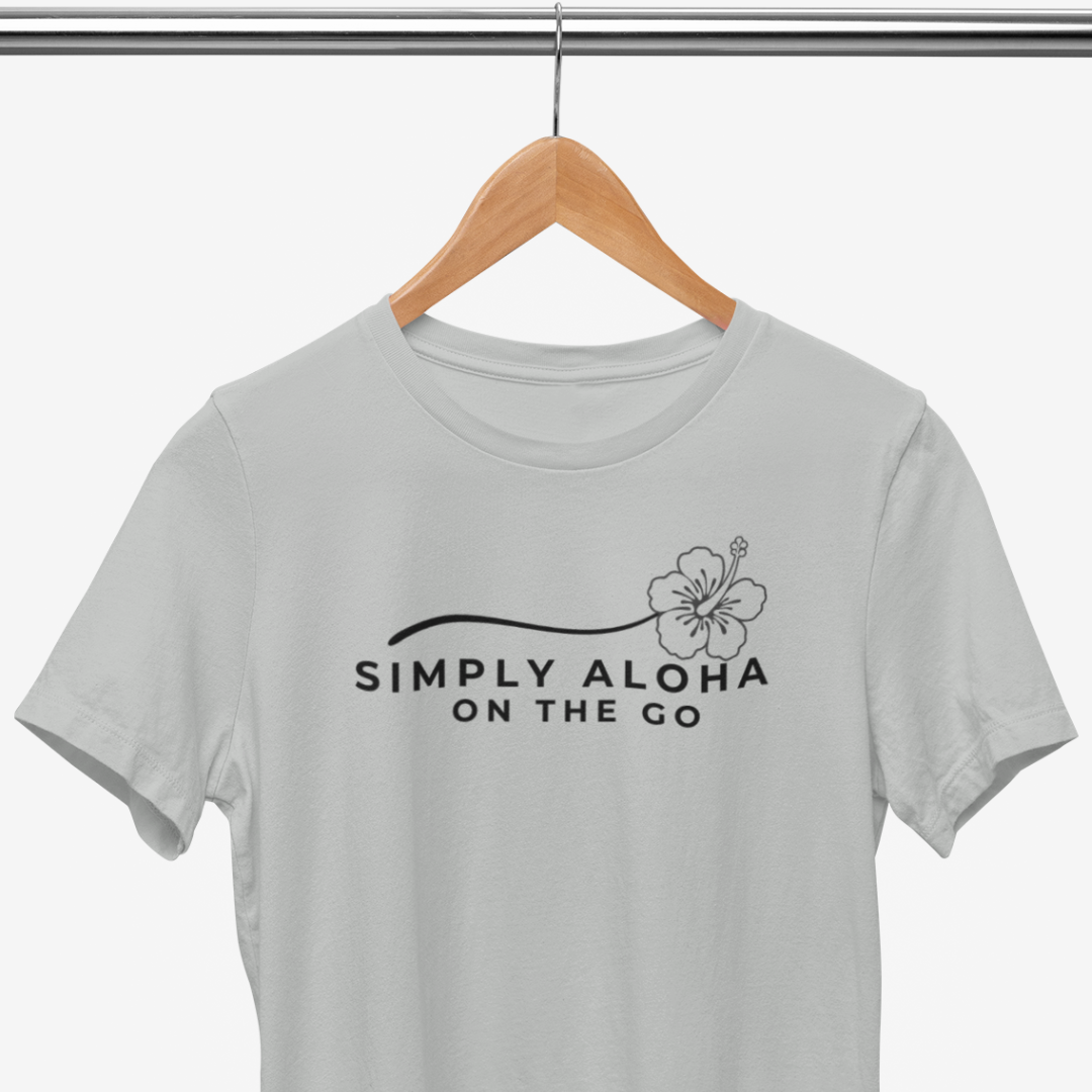 Front view of hibiscus brand logo reading Simply Aloha On The Go signature white t-shirt Available in 8 colors of Hawaii and sizes