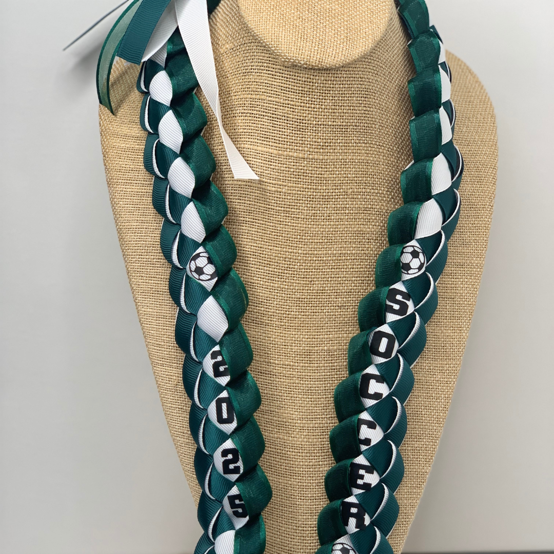Closeup of a Custom soccer ribbon lei in team colors for 2026 senior night. Handmade sports gift of Aloha by Simply Aloha On The Go, AZ.