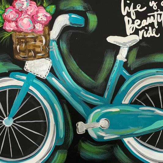 Spring Blossom DIY Paint Kit featuring the colorful bicycle with a basket of flowers with our on a black background, supplies included.