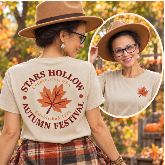 Stars Hollow Autumn Festival T-Shirt in sand with front maple leaf and double-sided fall graphic design