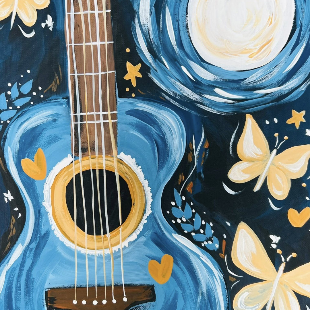 Close-up of a blue guitar with artistic floral and butterfly designs on a dark background