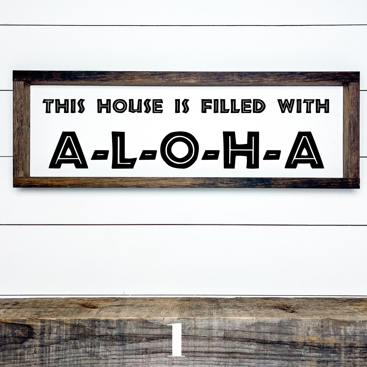Handcrafted island style wood sign reading “This House Is Filled With Aloha” for tropical home decor