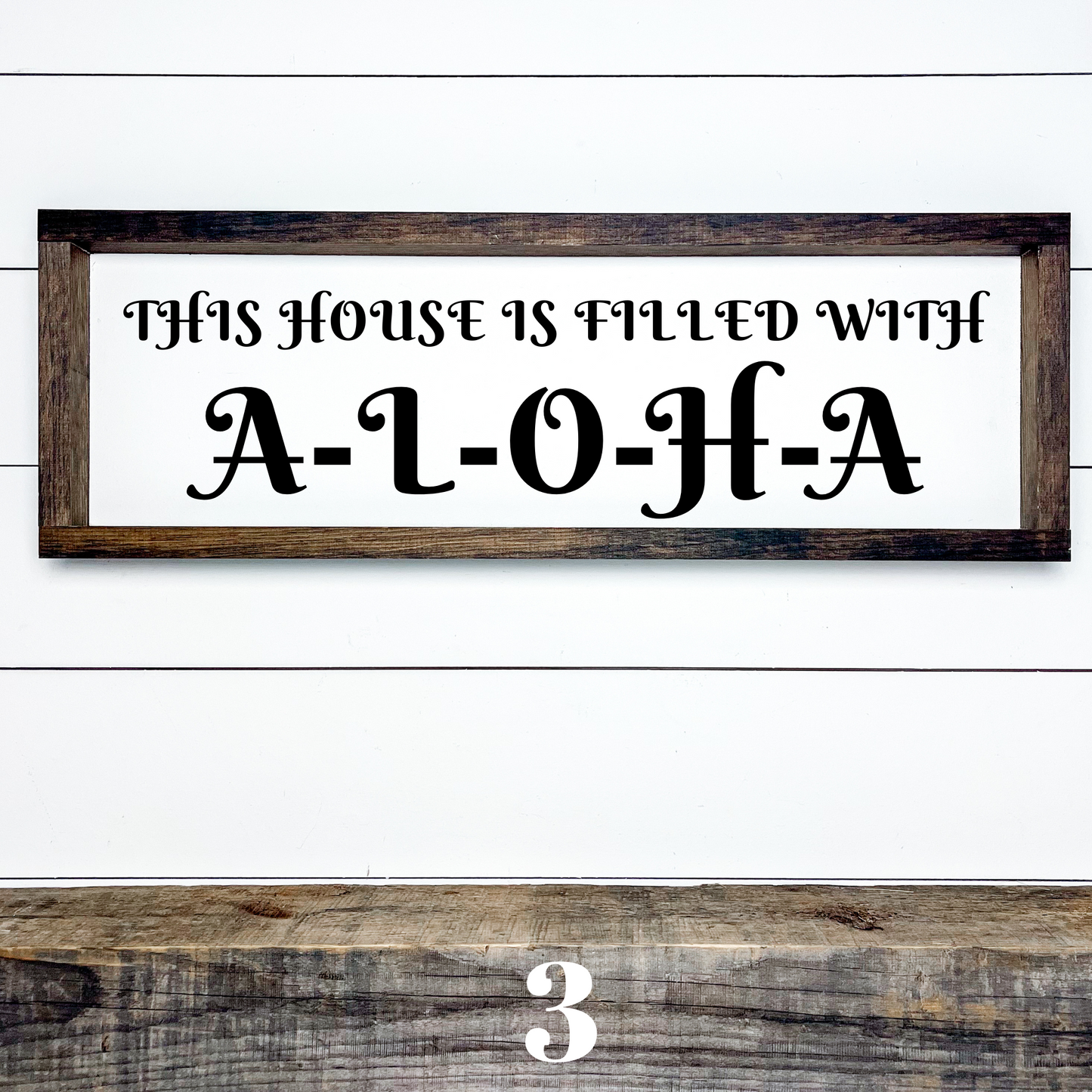 Handcrafted island style wood sign reading “This House Is Filled With Aloha” for tropical home decor