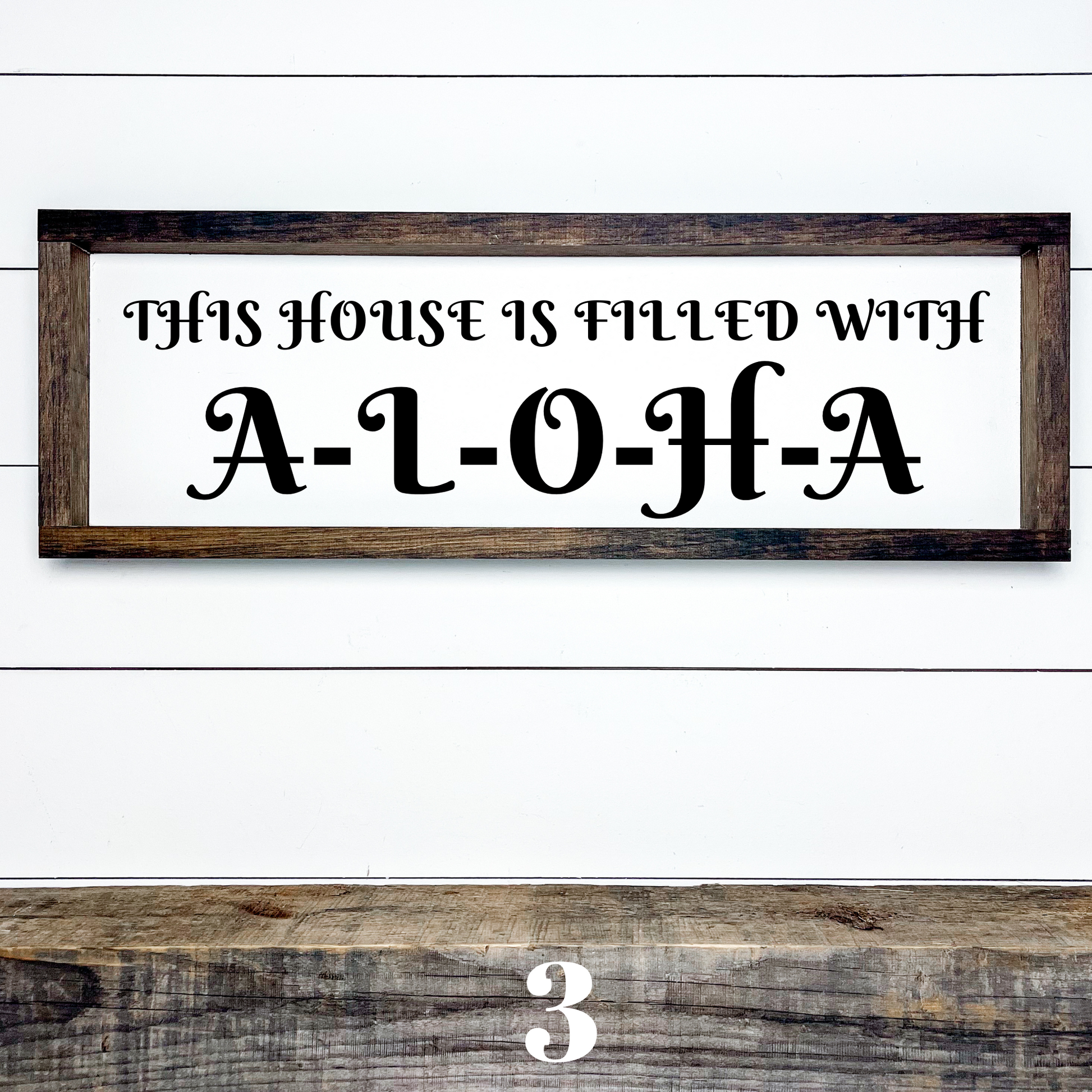 Handcrafted island style wood sign reading “This House Is Filled With Aloha” for tropical home decor