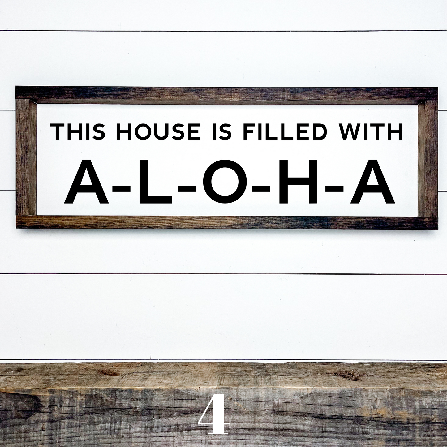 Handcrafted island style wood sign reading “This House Is Filled With Aloha” for tropical home decor
