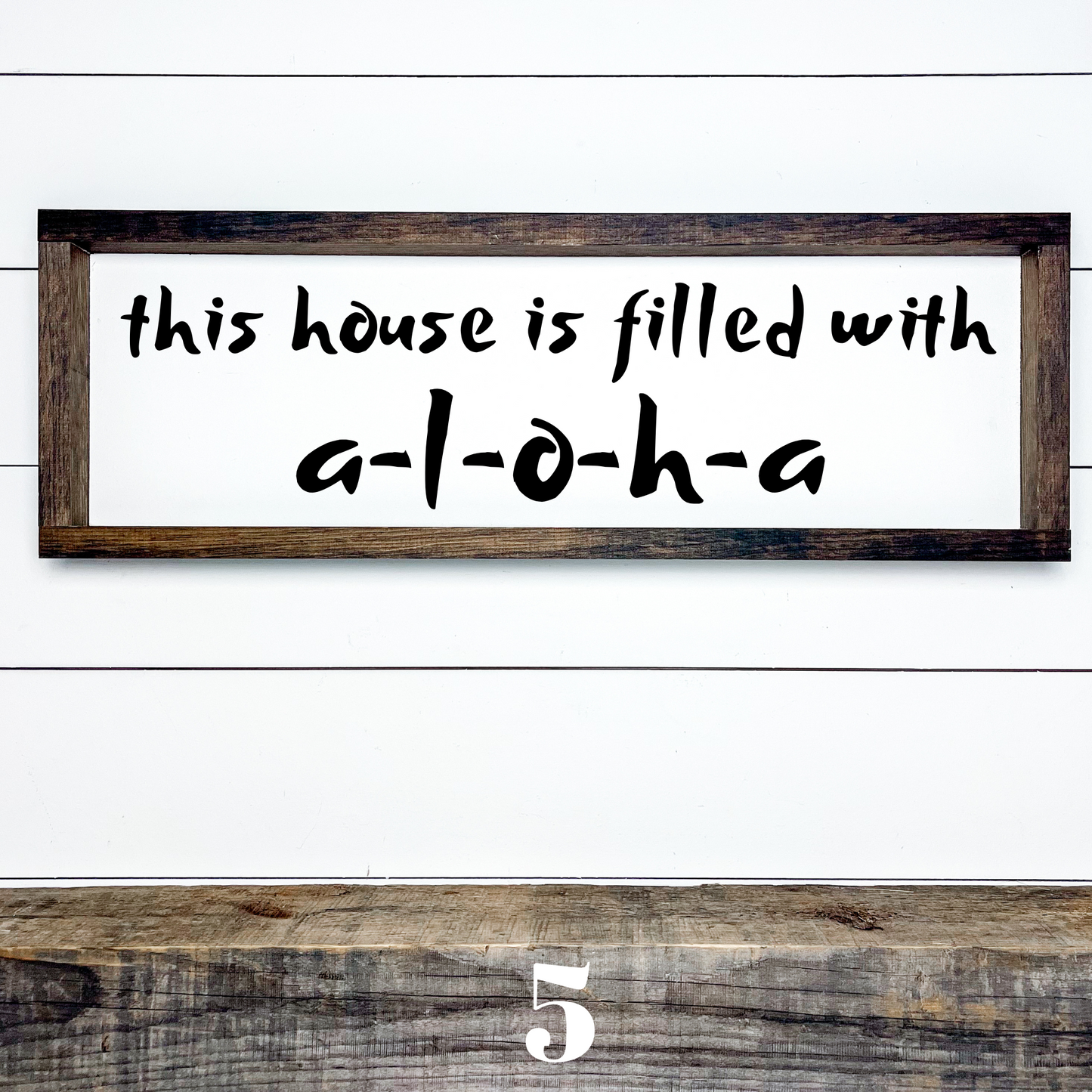 Handcrafted island style wood sign reading “This House Is Filled With Aloha” for tropical home decor