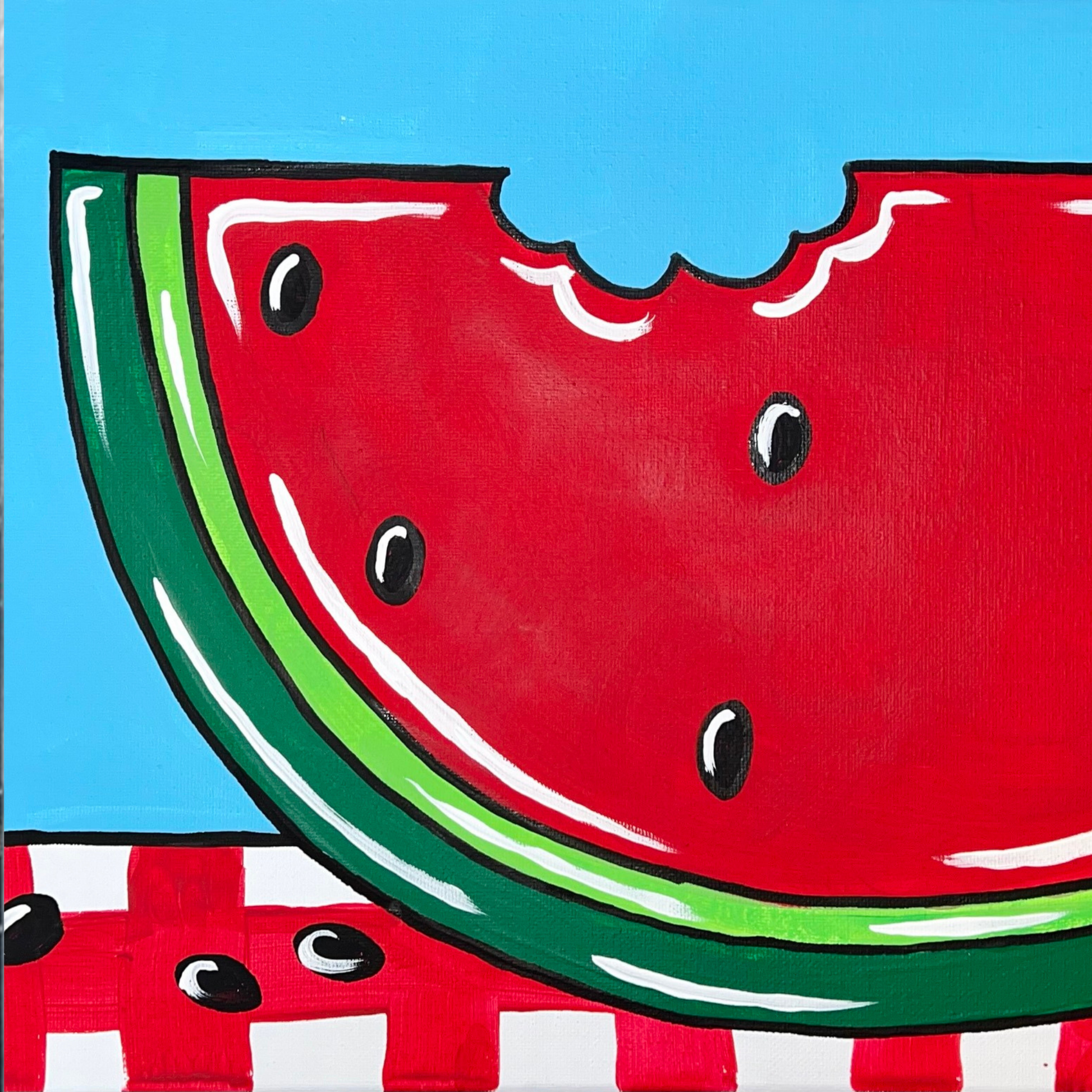 A close-up of a red watermelon slice with black seeds and a green rind on a red-and-white checkered picnic blanket background.