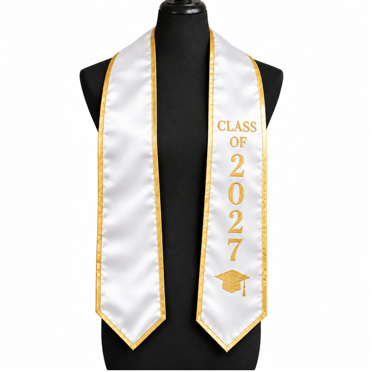 White graduation stole with gold trim, Class of 2027 lettering and graduation cap design.