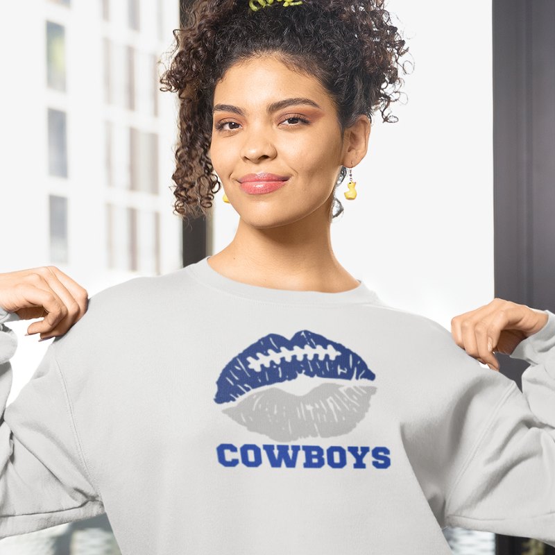 Model wearing a grey comfy football sweatshirt featuring the bold lip design and team colors.